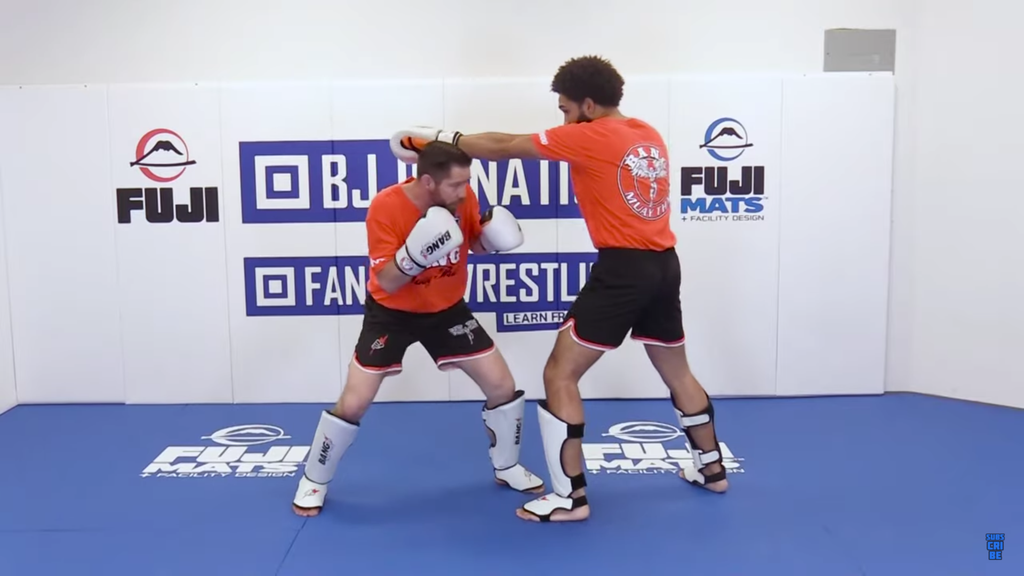 Slip Outside The Jab into a Right Hook to The Body With Duane Bang Ludwig