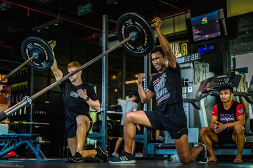 The Synergy of Weightlifting and Muay Thai Training